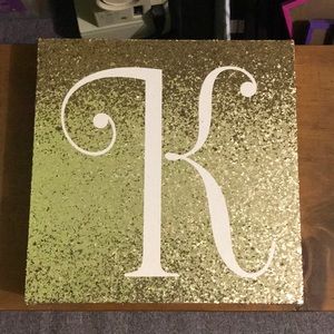 Gold K monogram sign